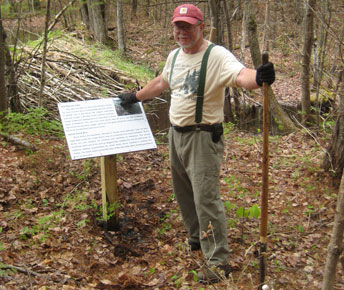 MFS District Forester Merle Ring in the Ten Mile River Demonstration Forest, Brownfield